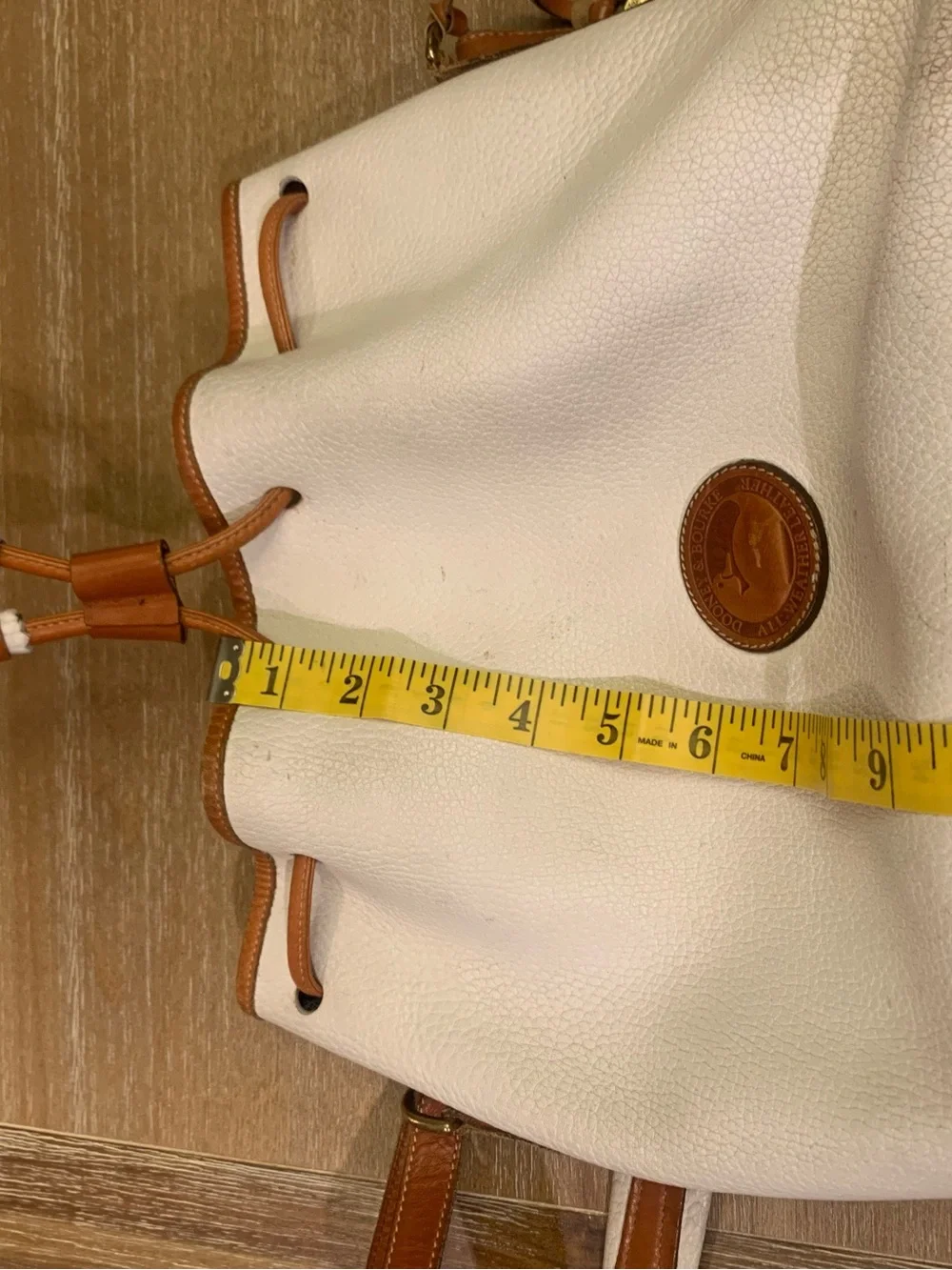 Vintage Dooney & Burke White and Brown Drawstring Bucket Bag with Tassel Accent - Picture 3 of 15